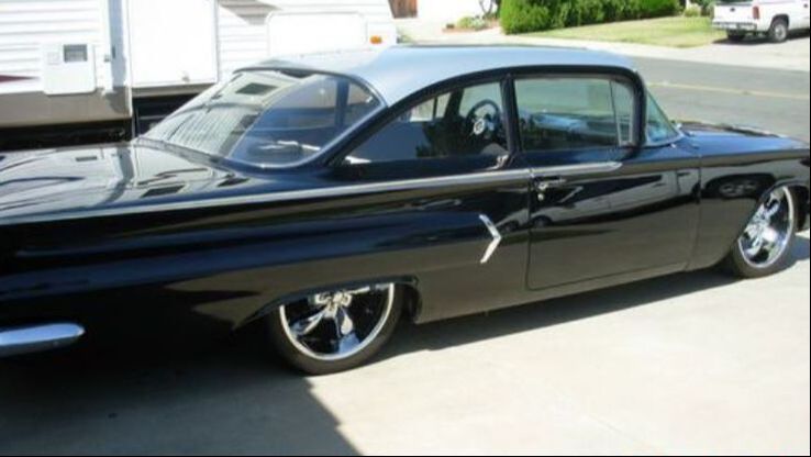 Black bagged Chevy Biscayne laid out with our bolt-on air bag suspension kit