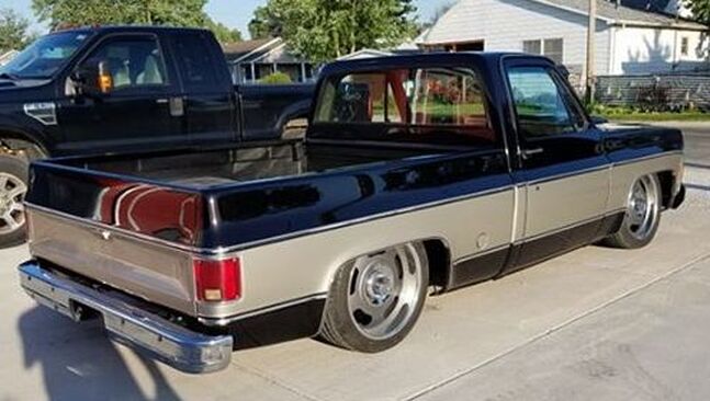 Chris' 2-tone brown 1978 Chevy Squarebody C10 in Illinois laid out on our air ride with 4-Link Kit
