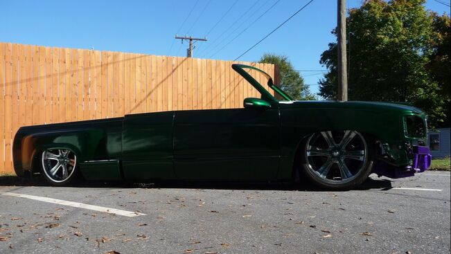 Jon's green 1994 Chevy C1500 OBS Roadster Sportside laid out on custom air ride